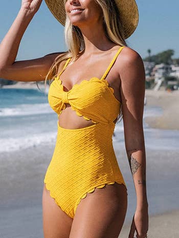model wearing the sunflower yellow bathing suit