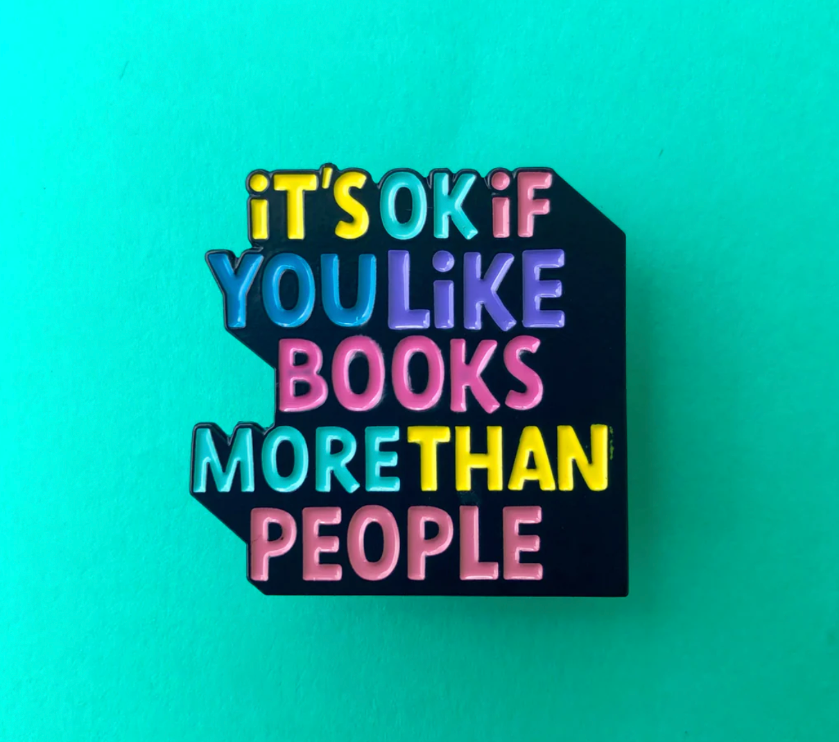 a colorful pin that reads 