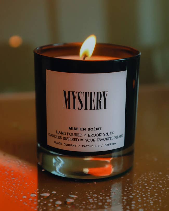 the lit mystery candle