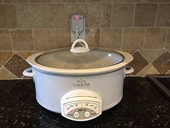 a crock pot plugged into the auto-off outlet