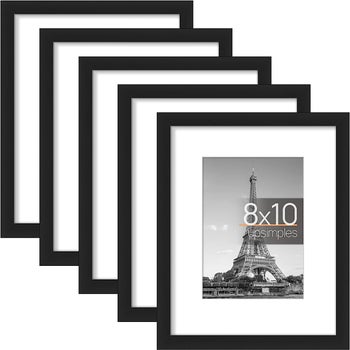five black picture frames