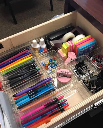reviewer's desk drawer using the organizers for pens, paper clips, etc.