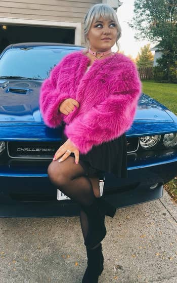 reviewer posing successful the pinkish jacket
