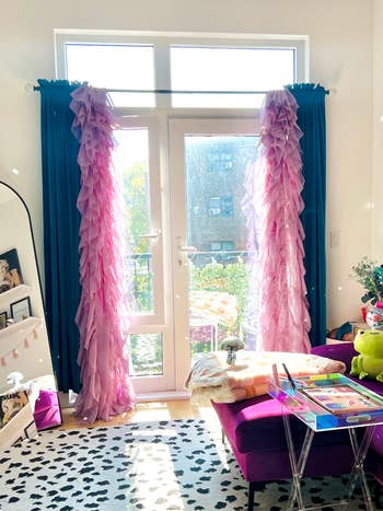 editor's purple ruffle curtains on living room window 
