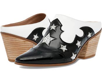 black and white pointed toe stacked heel mules with rhinestone stars
