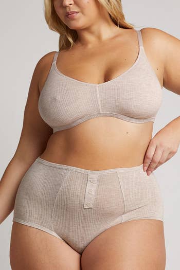 model wearing the sand-colored bra