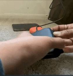 Reviewer pulling out the black version from its compact size all the way out to the three part mat