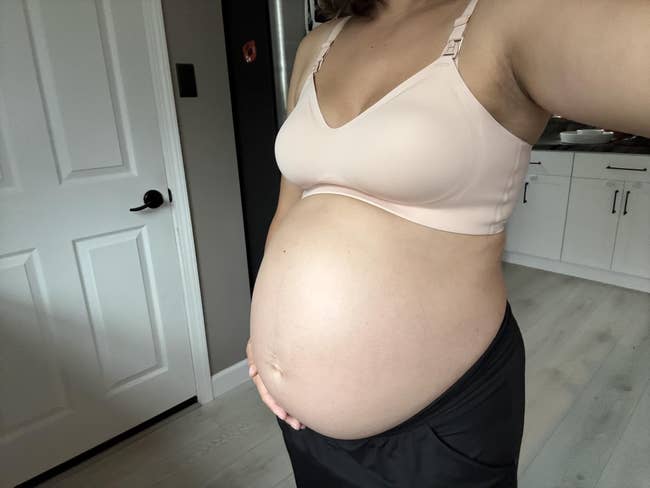 A reviewer wearing the bra