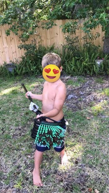 kid carrying astir   the stab-a-nut filled with gum balls