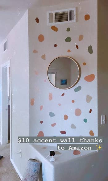 the stickers on a reviewer's accent wall 