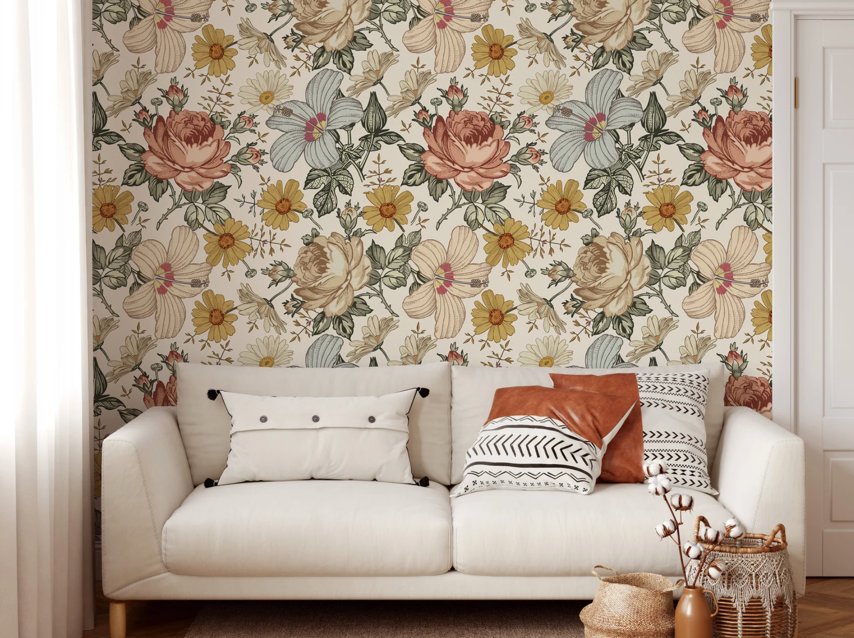 pink, blue, and yellow vintage floral peel-and-stick wallpaper above white couch