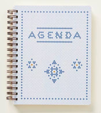 white retro tile patterned spiral planner with the words 