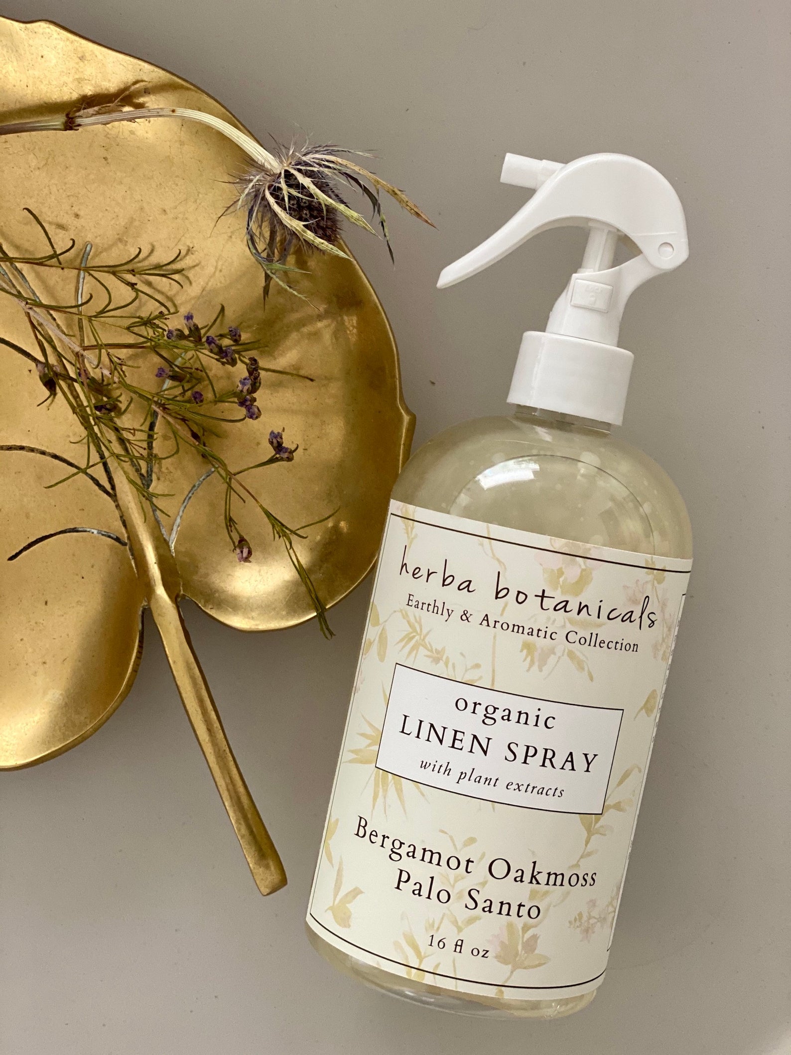 bottle of bergamot oakmoss scented linen spray