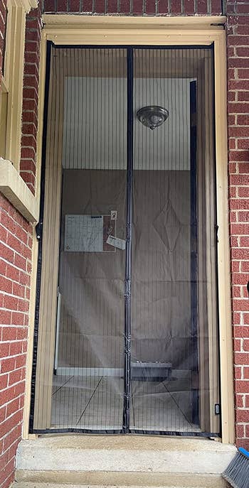 a reviewer photo of the installed magnetic screen door 