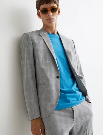 front of model wearing the blazer over a t-shirt