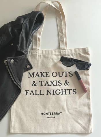 the taxi cab tote with the text, 