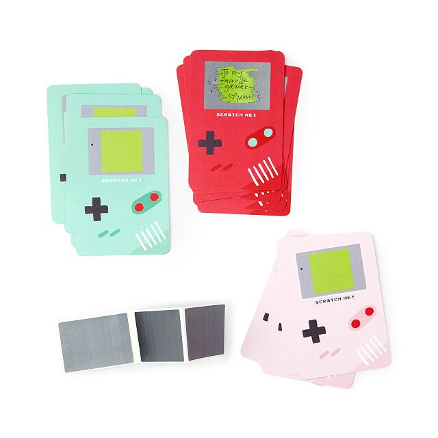 the set of three different colored gamer notes