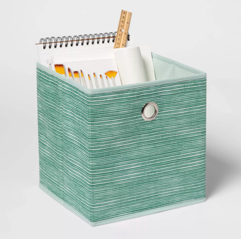 a teal storage cube