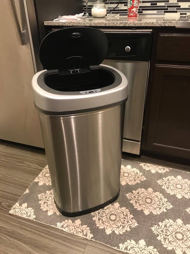 A reviewer's stainless steel trash can