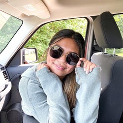 another reviewer in the black lenses and gold frames