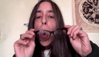 GIF of reviewer breathing onto glasses that don't fog up
