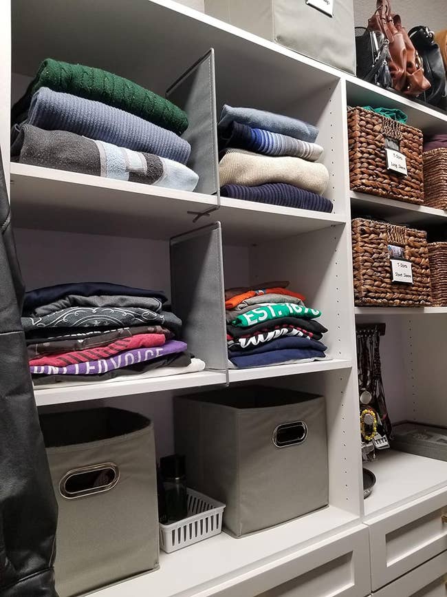 a closet organized with dividers