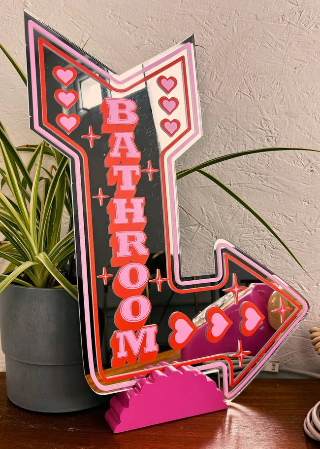 Arrow-shaped pinkish motion with