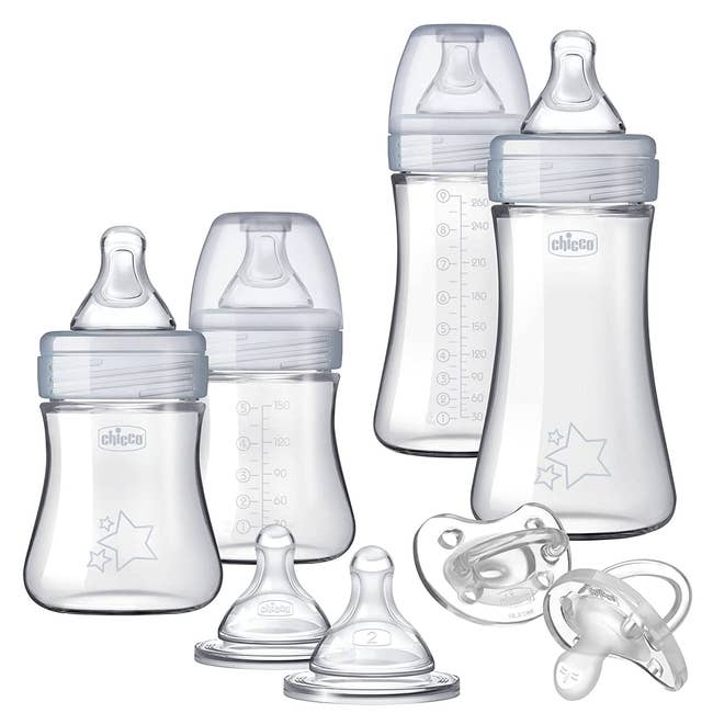 four bottles, two nipples, and two pacifiers