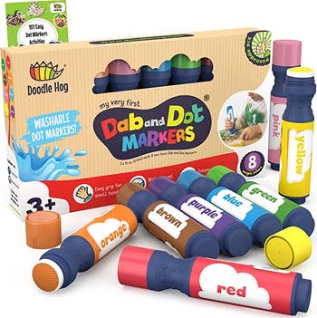 the dab and dot markers in a box and laid out