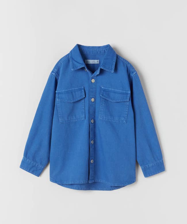 a blue overshirt