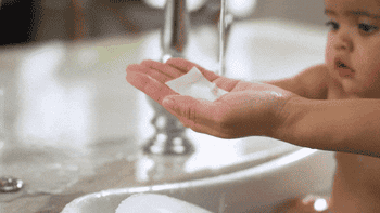 gift of a person dissolving the sheet into soap