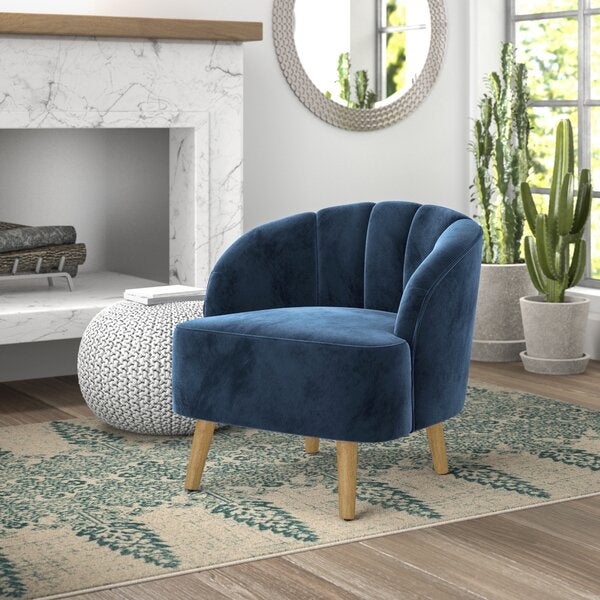 a velvet blue accent chair