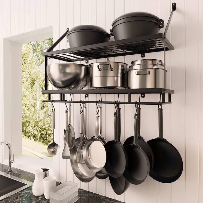 mounted pot rack with two shelfs and hanging pots