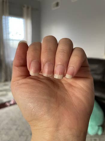 Reviewer's nails before using nail buffer
