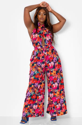 Model wearing colorful printed jumpsuit