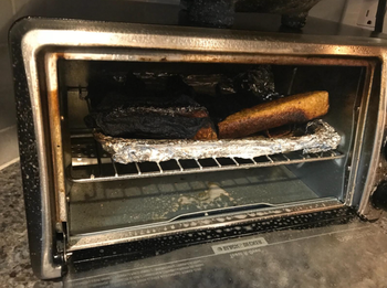 reviewer's burnt food after fire started in toaster oven 