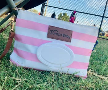 Reviewer image of pink striped wristlet