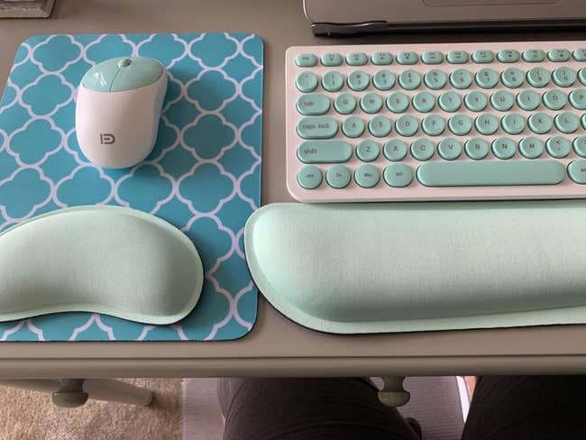 reviewer photo of the light green gel pads in front of a mouse and keyboard