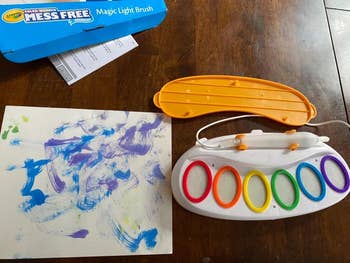 Crayola Mess Free Magic Light Brush set with brush, palette, and color swatches