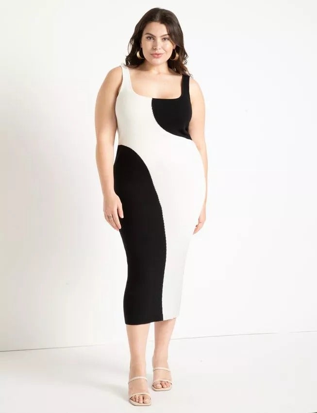 model wearing black and white midi color-blocked knit tank dress