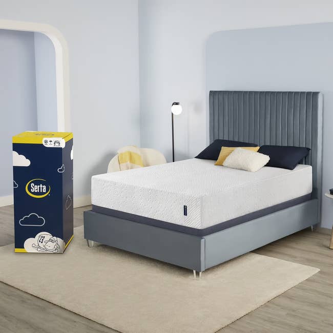 Serta mattress acceptable up successful a modern chamber with a gangly headboard and a Serta mattress container nearby