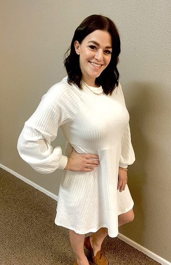 reviewer wearing knit dress in white 