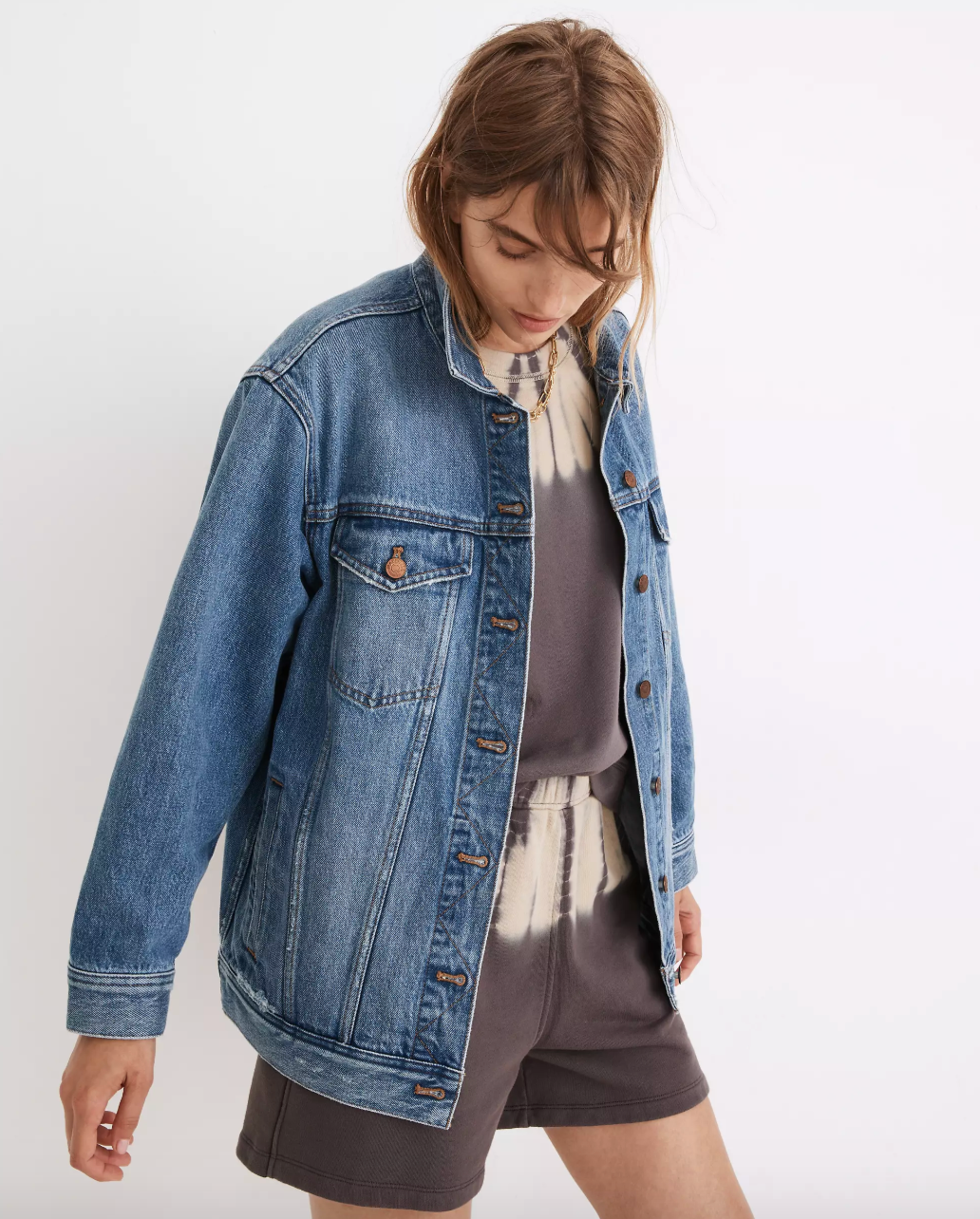 model wearing denim jacket