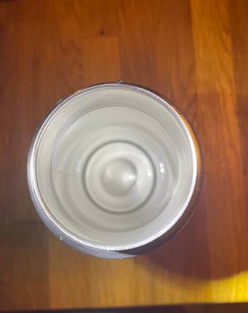 Top view of an empty, aluminum beverage can