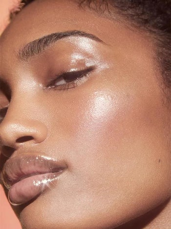 close-up of a model showing off the highlight on their face