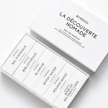 Byredo La Découverte Nomade perfume set, featuring six fragrance samples successful a sleek achromatic box