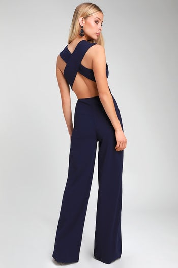 Image of model wearing navy jumpsuit
