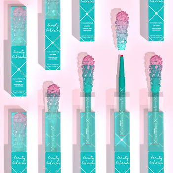 the lip liners in teal packaging with a cap shaped like crystalized sugar