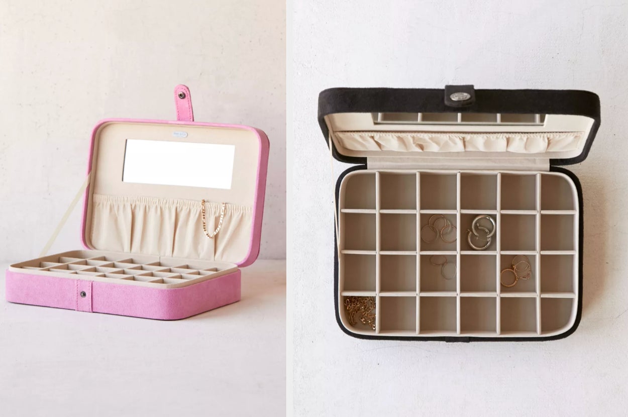 Pink Jewelry holder with square compartments, four pouches, and a rectangular mirror, birds-eye-view of product in black