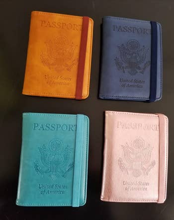 reviewer photo of four different colored passport holders